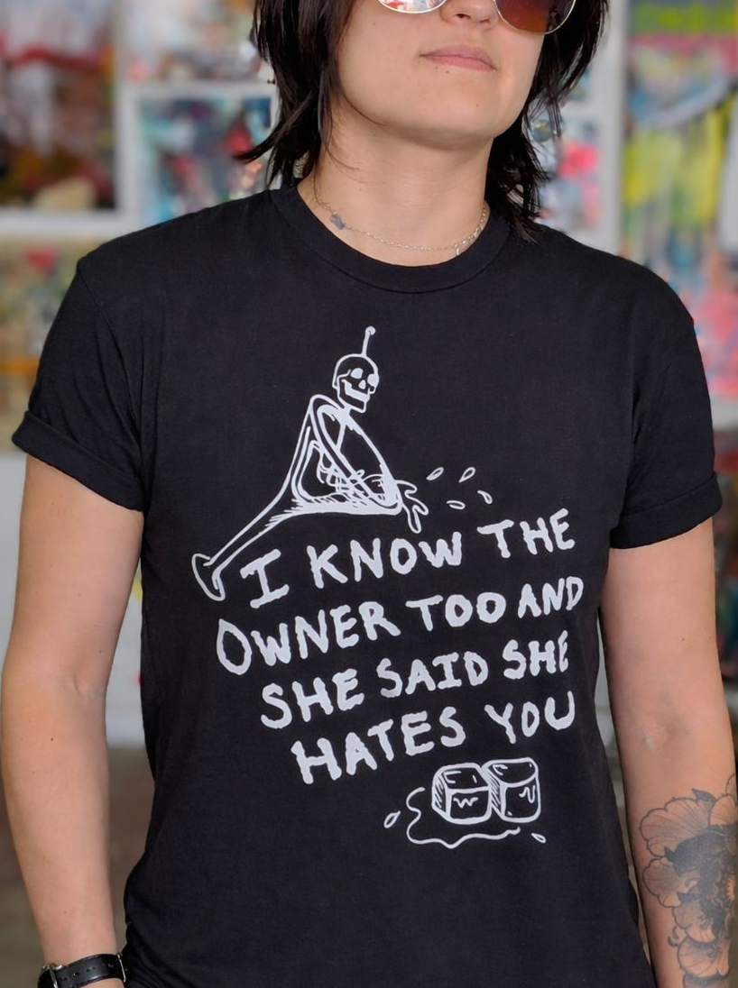Black bartender shirt with text that says "I Know The Owner Too And She Said She Hates You"
